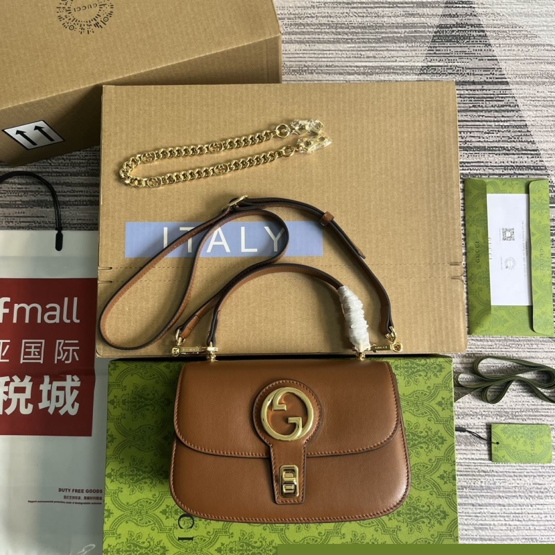 G*u*i top handle bags